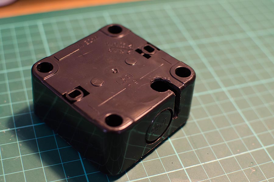 The cable holes in the enclosure
